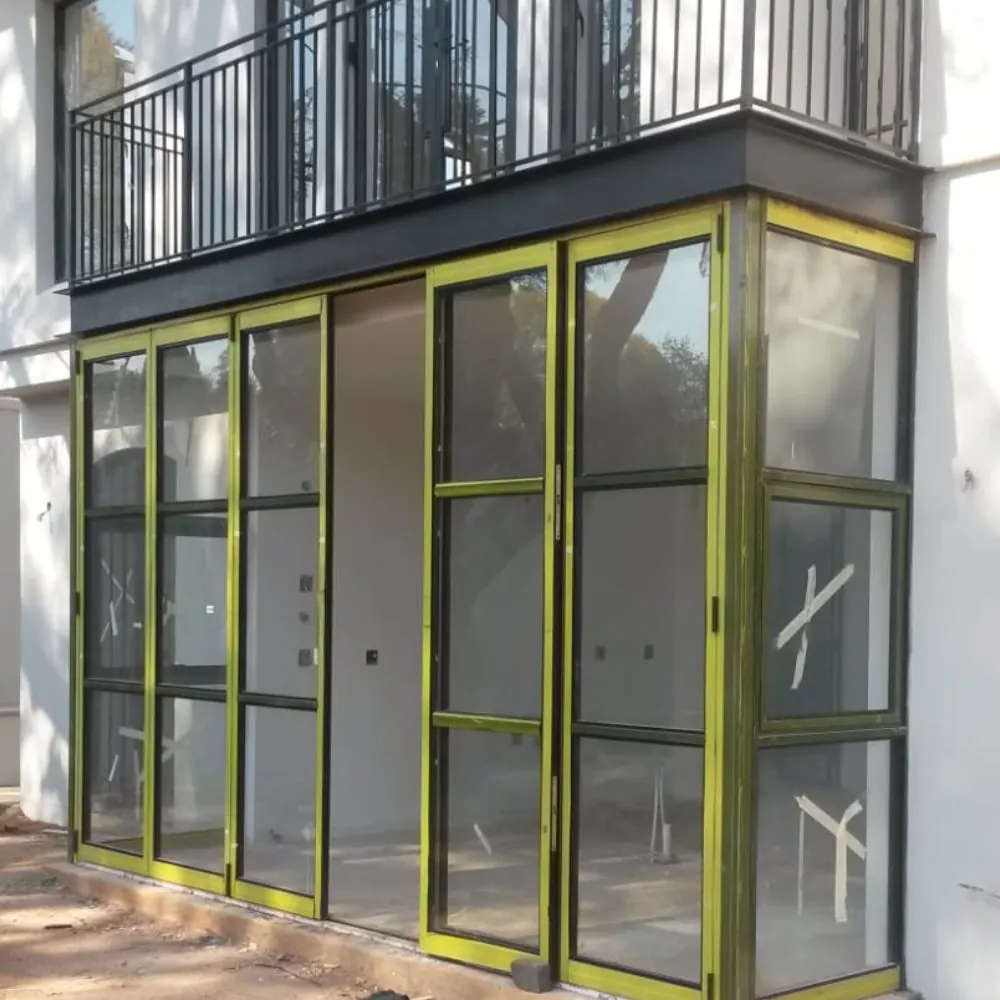 Aluminium bifold doors installed on an upper floor balcony in Gauteng