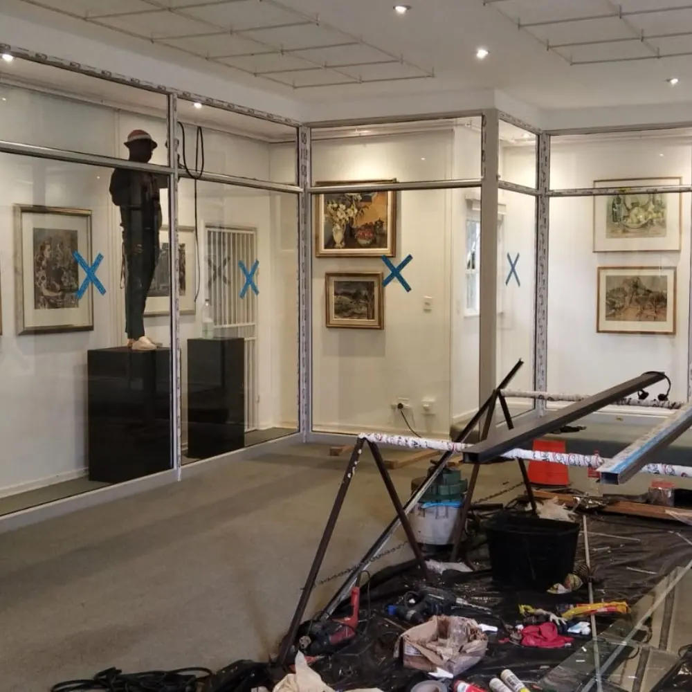 Aluminium and glass shopfitting installation for a commercial client