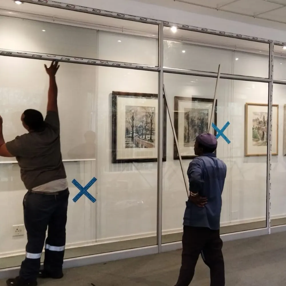 KSR Group installers fitting aluminium and glass in a commercial fit-out